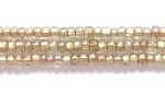 Czech Seed size 11 crystal brass lined iridescent