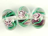 Image Czech Handmade Lampwork rondell 12 x 8mm clear with purple flowers