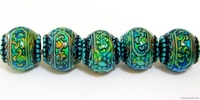 Image Mirage beads Blue mystique 11 x 12.5mm color changing