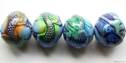 Image Mirage beads Mermaid's tale 19 x 16mm color changing